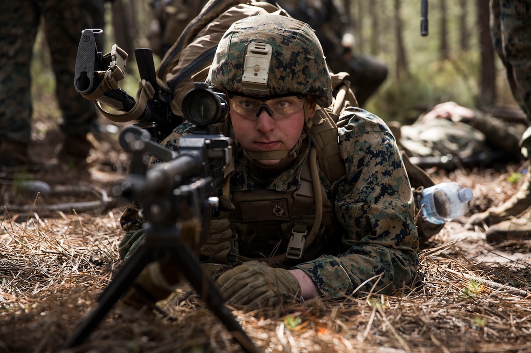 A U.S. Marine with Special Purpose Marine Air-Ground Task Force-Crisis Response-Africa 19.2, Marine Forces Europe and Africa, posts security during a Tactical Recovery of Aircraft and Personnel training exercise in Troia, Portugal, April 5, 2019. SPMAGTF-CR-AF is deployed to conduct crisis-response and theater-security operations in Africa and promote regional stability by conducting military-to-military training exercises throughout Europe and Africa. (U.S. Marine Corps photo by Cpl. Margaret Gale)