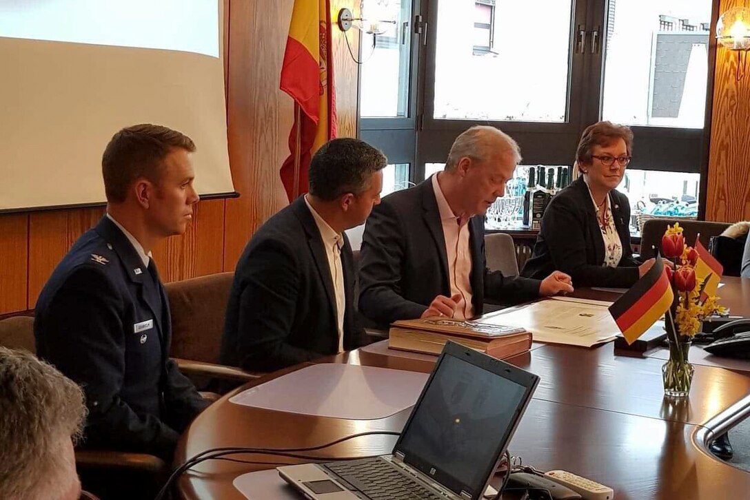 The mayors of Rota, Spain and Ramstein-Miesenbach, Germany signed a city partnership agreement at Ramstein-Miesenbach City Hall on April 8. U. S. Air Force Col. George Granholm, 521st Air Mobility Operations Wing vice commander, served as a witness for the agreement.