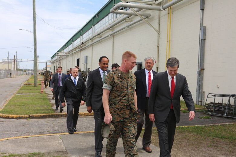 Roy Cooper, North Carolina governor speaks with Col. Russell C. Burton, commanding officer of Marine Corps Air Station New River during a tour of the installation and buildings damaged by Hurricane Florence at MCAS New River, N.C., April 9, 2019. This is Cooper’s initial command visit to Marine Corps Base Camp Lejeune and MCAS New River as Governor of North Carolina. During his tour Cooper met with senior leaders of both installations and saw first-hand the damage left by Hurricane Florence. (U.S. Marine Corps photos by Cpl. Jonathan Sosner)