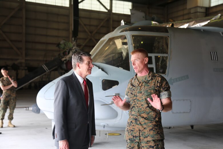 Roy Cooper, North Carolina governor speaks with Col. Russell C. Burton, commanding officer of Marine Corps Air Station New River during a tour of the installation and buildings damaged by Hurricane Florence at MCAS New River, N.C., April 9, 2019. This is Cooper’s initial command visit to Marine Corps Base Camp Lejeune and MCAS New River as Governor of North Carolina. During his tour Cooper met with senior leaders of both installations and saw first-hand the damage left by Hurricane Florence. (U.S. Marine Corps photos by Cpl. Jonathan Sosner)