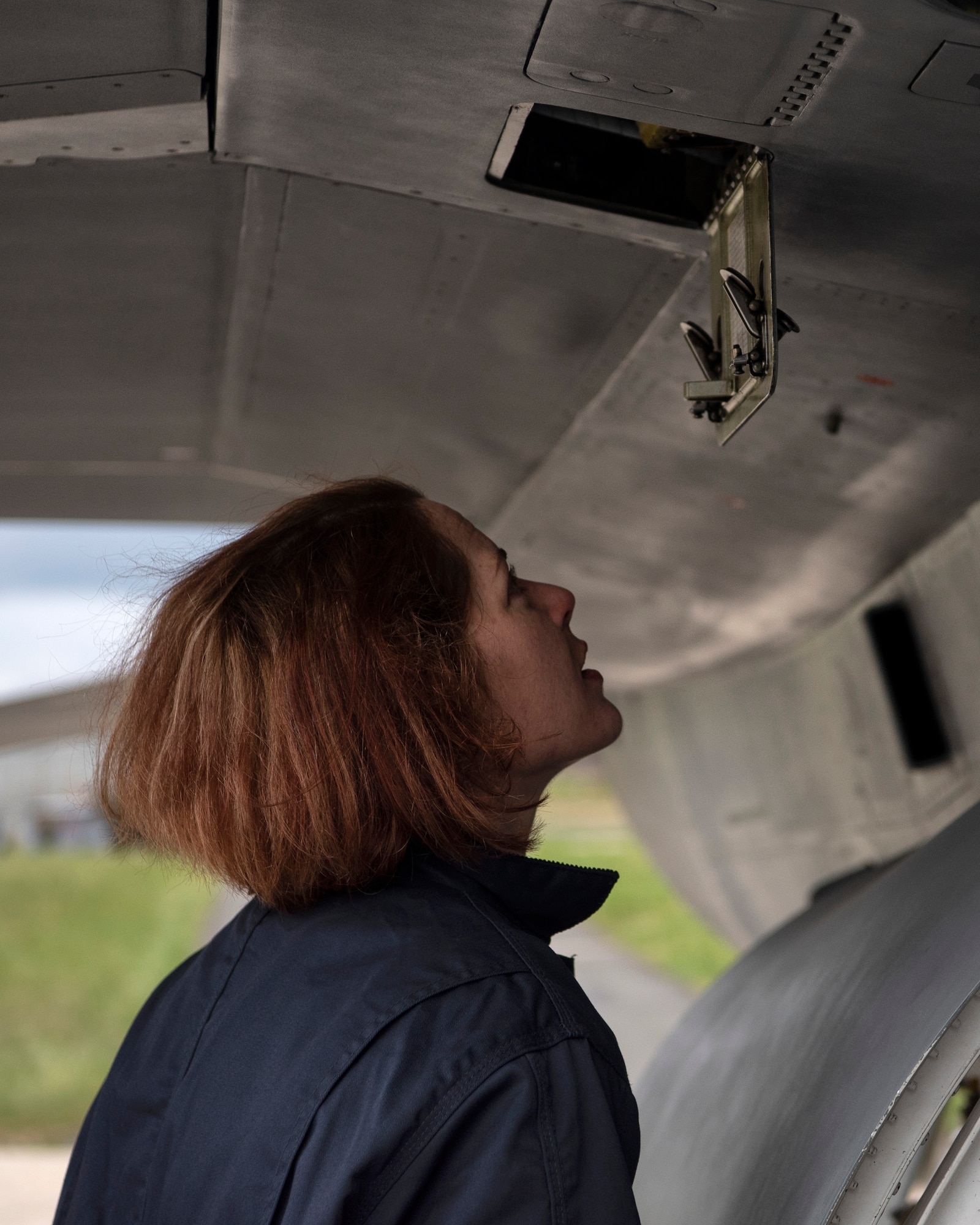 U.S. Air Force Staff Sgt. Stephanie Gillie, 52nd Security Forces Squadron investigator, inspects an F-16 Fighting Falcon at Spangdahlem Air Base, Germany, April 3, 2019. Gillie participated in the 52nd Aircraft Maintenance Squadron's new Crew Chief for a Day program which invites Airmen to experience working a day on the flightline. The weekly program launched in March 2019, and is scheduled to be a year-round event. (U.S. Air Force photo by Airman 1st Class Valerie Seelye)