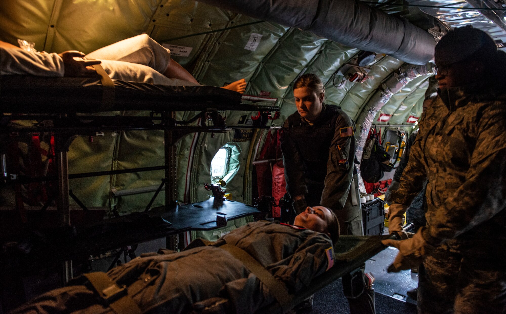 U.S. Airmen assigned to the 20th Medical Group (MDG) load a 914th Air Reserve Wing Aeromedical Evacuation Squadron (AES), simulated, patient onto a U.S. Air Force KC-135 Stratotanker at Shaw Air Force Base, S.C., April 9, 2019.