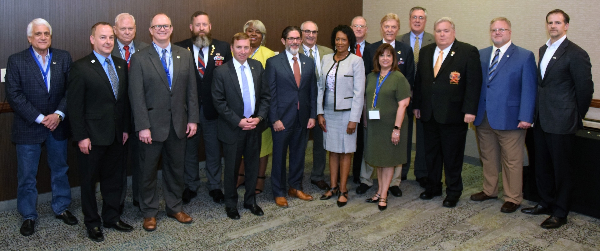 Honorary commanders pose for a group photo at the conclusion of the 433rd Airlift Wing’s honorary commanders induction ceremony April 6 at a San Antonio hotel. The ceremony signifies the relationship between the military and civilian communities.