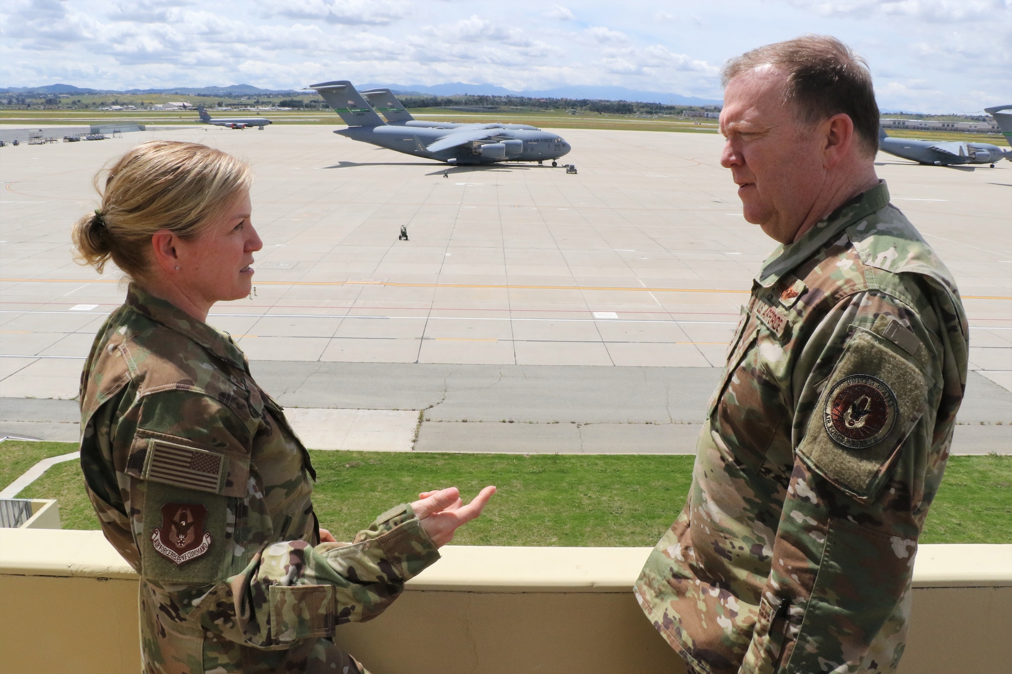 U.S. Air Force Col. Melissa Coburn, commander, 452nd Air Mobility Wing, March Air Reserve Base, discusses March ARB’s capabilities and opportunities with U.S. Air Force Lt. Gen. Richard Scobee, commander, Air Force Reserve Command, while overlooking the flight line at wing headquarters building here April 5, 2019. AFRC senior leadership toured March ARB to learn about the 452nd AMW’s mission, capabilities and challenges as part of a three-day unit visit.