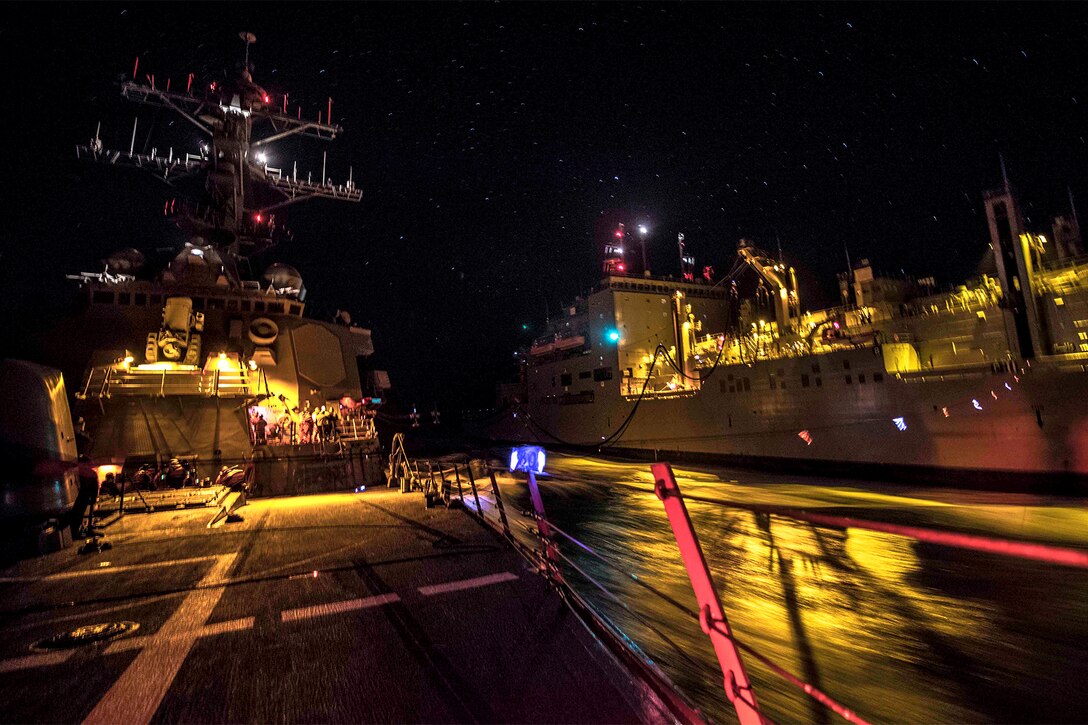 A ship conducts a replenishment.