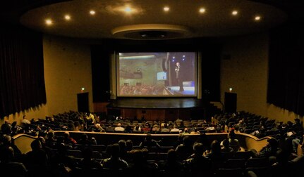 Friends, families and well-wishers gather at the Roxy Theater in Bremerton, Washington, to watch a livestream feed of the annual Puget Sound Naval Shipyard & Intermediate Maintenance Facility Employee of the Year Ceremony April 10. The shipyard arranged for the theater to be available as overflow seating for those who could not be seated in the Admiral Theater, where the ceremony was held.