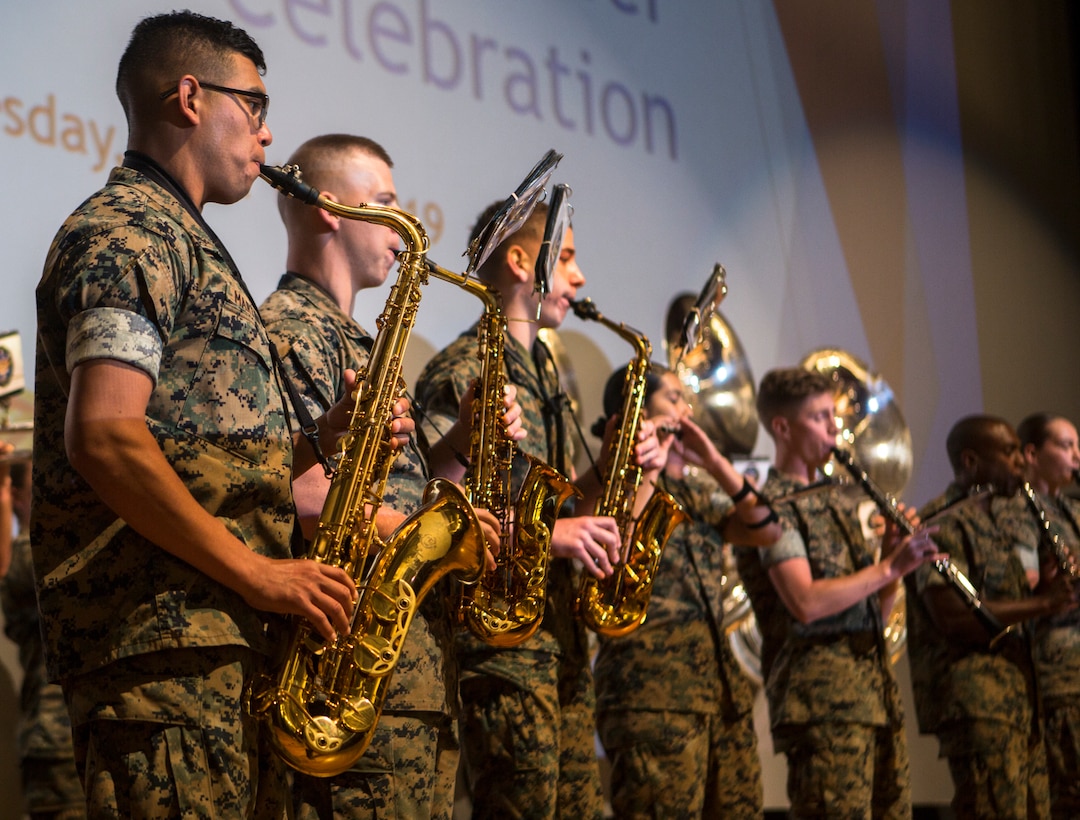 The 3rd Marine Aircraft Wing band performs during the Marine Corps Air Station Miramar volunteer awards ceremony at MCAS Miramar, Calif., April 10. MCAS Miramar hosted this event to recognize and reward volunteers for their time and efforts. (U.S. Marine Corps photo by Sgt. Becky Cleveland)