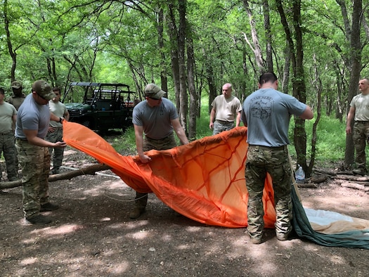 Instructors from the 66th Training Squadron’s Survival, Evasion, Resistance and Escape cadre at Joint Base San Antonio-Lackland showcase their knowledge to recruiters from the 330th Recruiting Squadron during an immersion tour March 28, 2019. The recruiters travelled from locations across the United States to get a better understanding of the career field and experience the training a candidate must complete to become a SERE specialist.