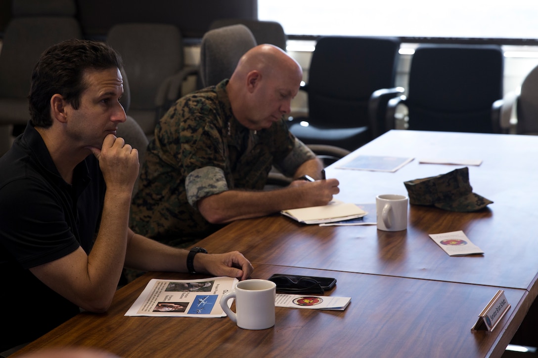 Sen. Brian Schatz of Hawaii attends a brief alongside Lt. Gen. David Berger, commander, U.S. Marine Corps Forces, Pacific, aboard Marine Corps Base Hawaii (MCBH), Aug. 24, 2017.