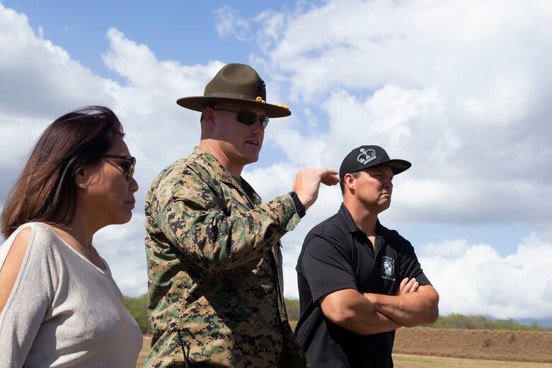 U.S. Marine Corps Chief Warrant Officer 2 Jeffrey Wright, center, officer in charge of Pu’uloa Range Training Facility, leads a tour of the grounds for Rep. Rida Arakawa, left, of Hawaii's Ewa District and Mitchell Tynanes, right, Ewa Neighborhood Board Chair, Marine Corps Base Hawaii (MCBH), Apr. 8, 2019.
