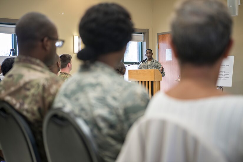 Col. Terrence Adams, 628th Air Base Wing commander, speaks with a base audience during a Feb. 2019 meeting at Joint Base Charleston. Base leadership hosted four town hall meetings during March and has four more planned for April.