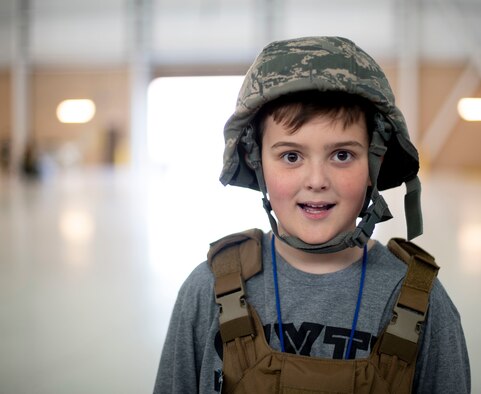 A sixth-grade student enjoys career day March 29, 2019, at Travis Air Force Base, California. Throughout the day more than 100 sixth-grade students had the opportunity to learn about Team Travis Airmen from different career fields. (U.S. Air Force photo by Airman 1st Class Jonathon Carnell)