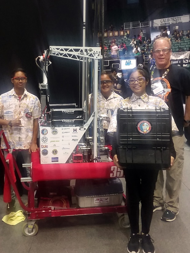 HONOLULU (March 31, 2019) - Honolulu District's Chief, Military Construction branch Tom Crump (right) participated as a volunteer mentor for Team 359 from Waialua at the FIRST (For Inspiration and Recognition of Science and Technology) Robotics Hawaii Regional competition held Friiday and Saturday at UH-Manoa's Stan Sheriff Center. Thirty-­four international high school teams competed for a chance to participate in the world championships April 17-20 in Houston. Along with the three regional winners, four other teams — ‘Iolani, Molokai, Maui and Maryknoll — will head to the world championships. The competition revolves around programming the robot to perform tasks that might emerge as part of a space exploration mission. This was the 12th anniversary of the Hawaii FIRST Robotics Competition (FRC) for high school students, with participants from 34 teams that include teams from Hawaii Island, Kauai, Maui, Molokai, Oahu, China, Japan and Taiwan. To compete in the FIRST (For Inspiration and Recognition of Science and Technology) Robotics Competition regional, high school students worked over a six-week period with professional mentors to design and build a robot that solved a specific problem.