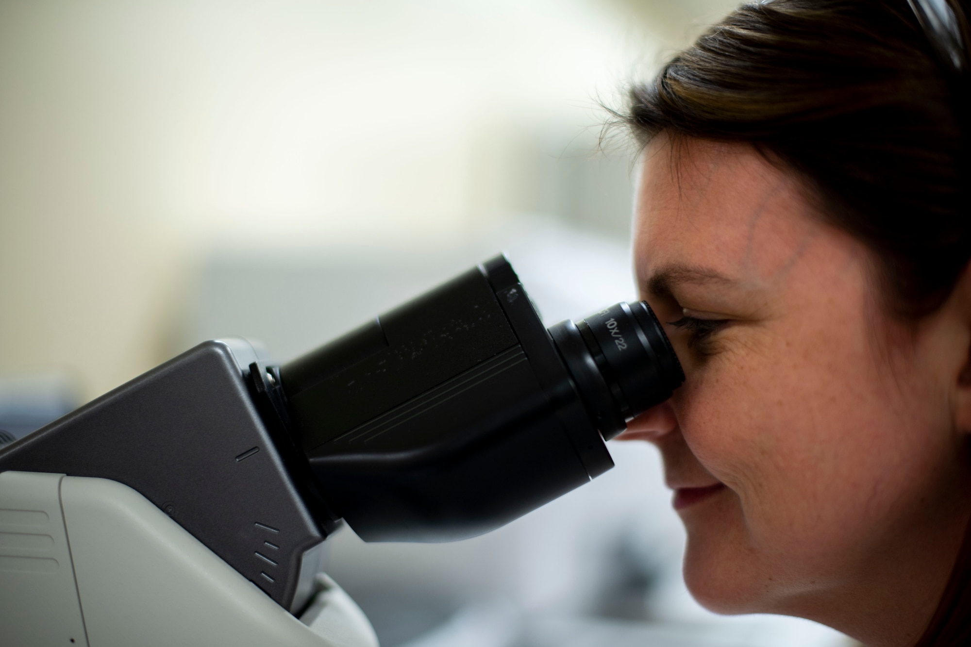 Tammy Higley, 60th Medical and Diagnostics Therapeutic Squadron Core Laboratory technician, looks at blood cells through a magnifying lens April 4, 2019, at Travis Air Force Base, California. The Core Lab at David Grant USAF Medical Center manages clinical chemistry, hematology, immunology and coagulation testing to aid in clinical diagnoses. (U.S. Air Force photo by Airman 1st Class Jonathon Carnell)