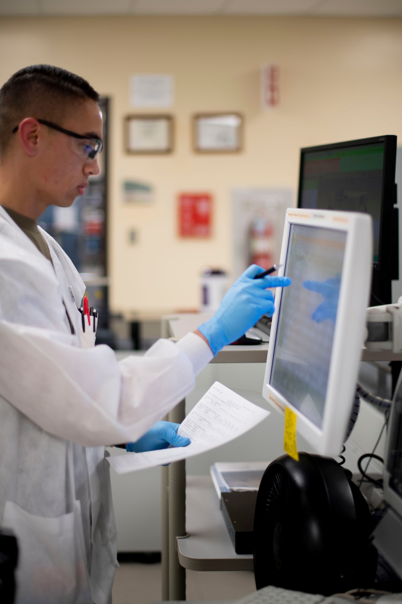 U.S. Air Force Staff Sgt. Eric Crandell, 60th Medical and Diagnostics Therapeutic Squadron Laboratory technician, reviews data on a monitor April 4, 2019, at Travis Air Force Base, California. David Grant USAF Medical Center operates the Air Force’s larges clinical laboratory, supporting 465 health care providers and 325,000 patients per year. Technicians perform 1.2 million tests annually in chemistry, special chemistry, hematology, coagulation, immunology, microbiology, point-of-care testing, histology, cytology and transfusion services. (U.S. Air Force photo by Airman 1st Class Jonathon Carnell)