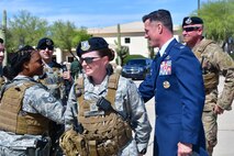 U.S Air Force Col. Mike Drowley, 355th Wing commander, greet 355th Security Forces defenders at Davis-Monthan Air Force Base, Ariz., April 11, 2019.