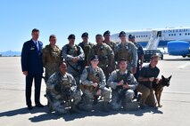 U.S Air Force Col. Mike Drowley, 355th Wing commander, poses for a photo with 355th Security Forces defenders at Davis-Monthan Air Force Base, Ariz., April 11, 2019.