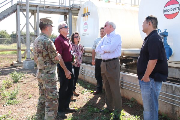 WHEELER ARMY AIRFIELD, Hawaii (Jan. 18, 2019) -- New Schofield Barracks Area Engineer Jean McAninch (center left) listens as Todd Barnes (second from left), Honolulu District's Chief of Engineering & Construction, discusses the overall construction layout plans for the Combat Aviation Brigade Phase 1 construction project to U.S. Army Corps of Engineers Director of Military Programs Senior Executive Lloyd Caldwell (center right).