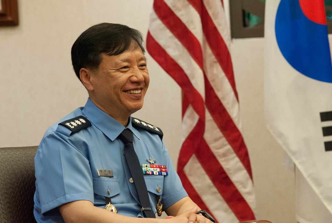 Republic of Korea Brig. Gen. Dae Joon Park, ROKAF Academy commandant, talks with United States Air Force Brig. Gen. Harold E. Rogers, Mobilization Assistant to the Director, Air and Cyberspace Operations, Headquarters Pacific Air Forces, during the ROKAFA’s visit to Joint Base Pearl Harbor-Hickam, Hawaii, Apr. 2, 2019.
