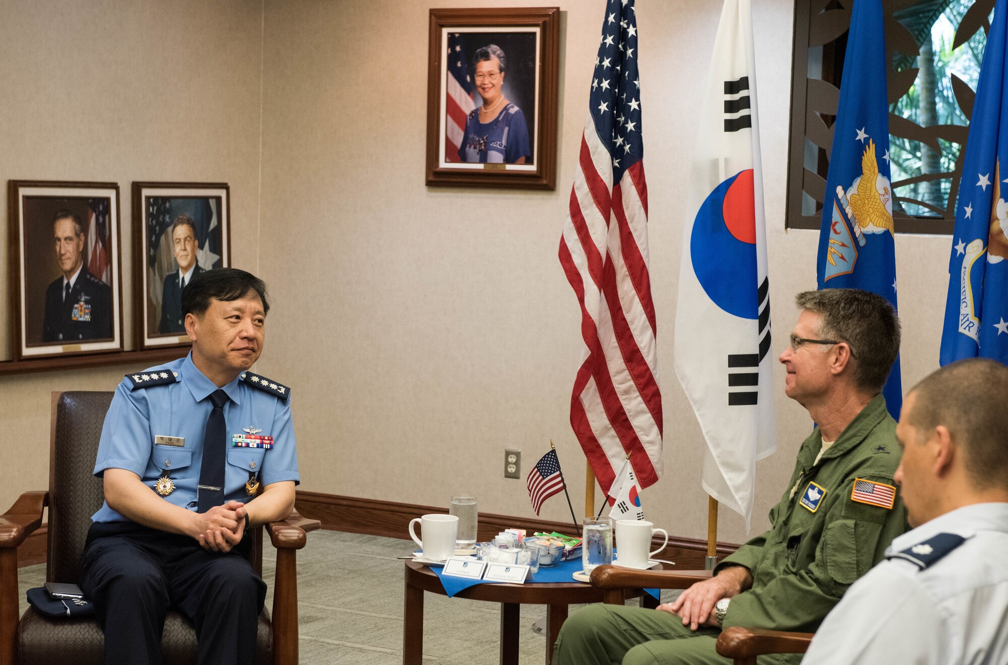 Republic of Korea Brig. Gen. Dae Joon Park, ROKAF Academy commandant, and United States Air Force Brig. Gen. Harold E. Rogers, Mobilization Assistant to the Director, Air and Cyberspace Operations, Headquarters Pacific Air Forces, meet during a visit to Joint Base Pearl Harbor-Hickam, Hawaii, Apr. 2, 2019.