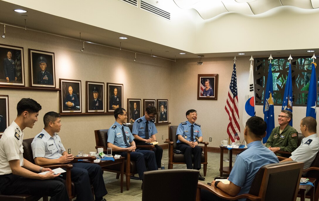 Republic of Korea Brig. Gen. Dae Joon Park, ROKAF Academy commandant, and United States Air Force Brig. Gen. Harold E. Rogers, Mobilization Assistant to the Director, Air and Cyberspace Operations, Headquarters Pacific Air Forces, meet during a visit to Joint Base Pearl Harbor-Hickam, Hawaii, Apr. 2, 2019.