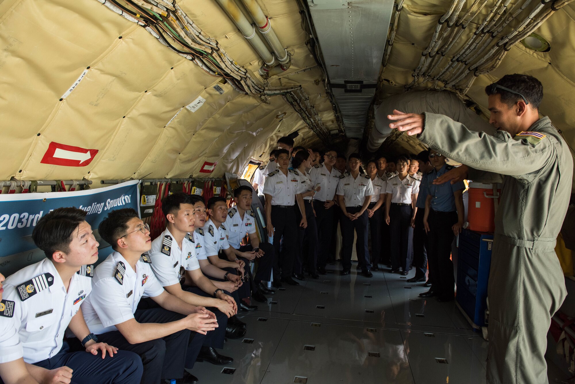 Republic of Korea Air Force academy cadets learn about the United States Hawaii Air National Guard’s KC-135 Stratotanker during a visit to Joint Base Pearl Harbor-Hickam, Hawaii, Apr. 2, 2019.