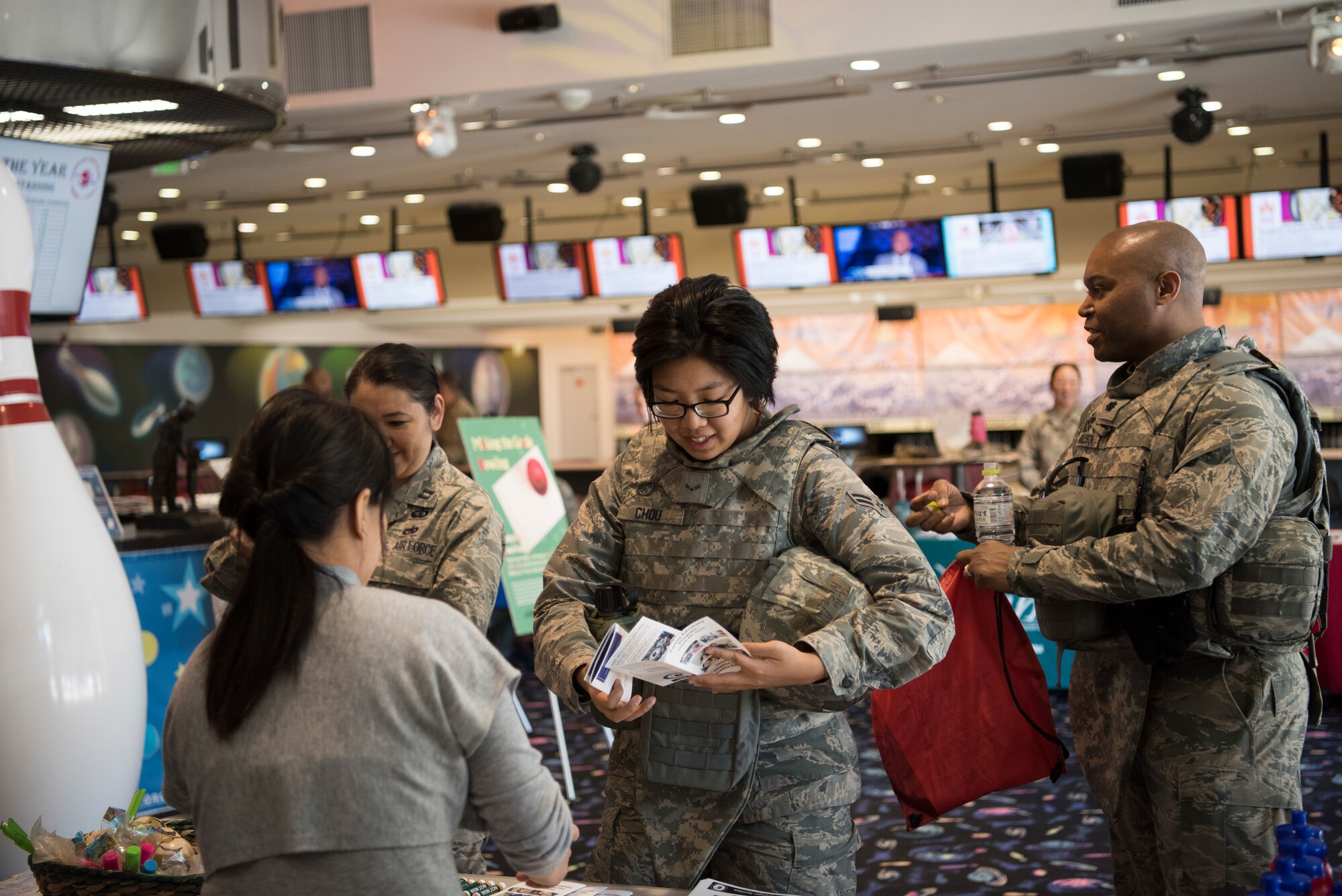 Members of Team Yokota receive information during the Family Advocacy and SAPR information fair, Apr. 11, 2019, at Yokota Air Base, Japan.
