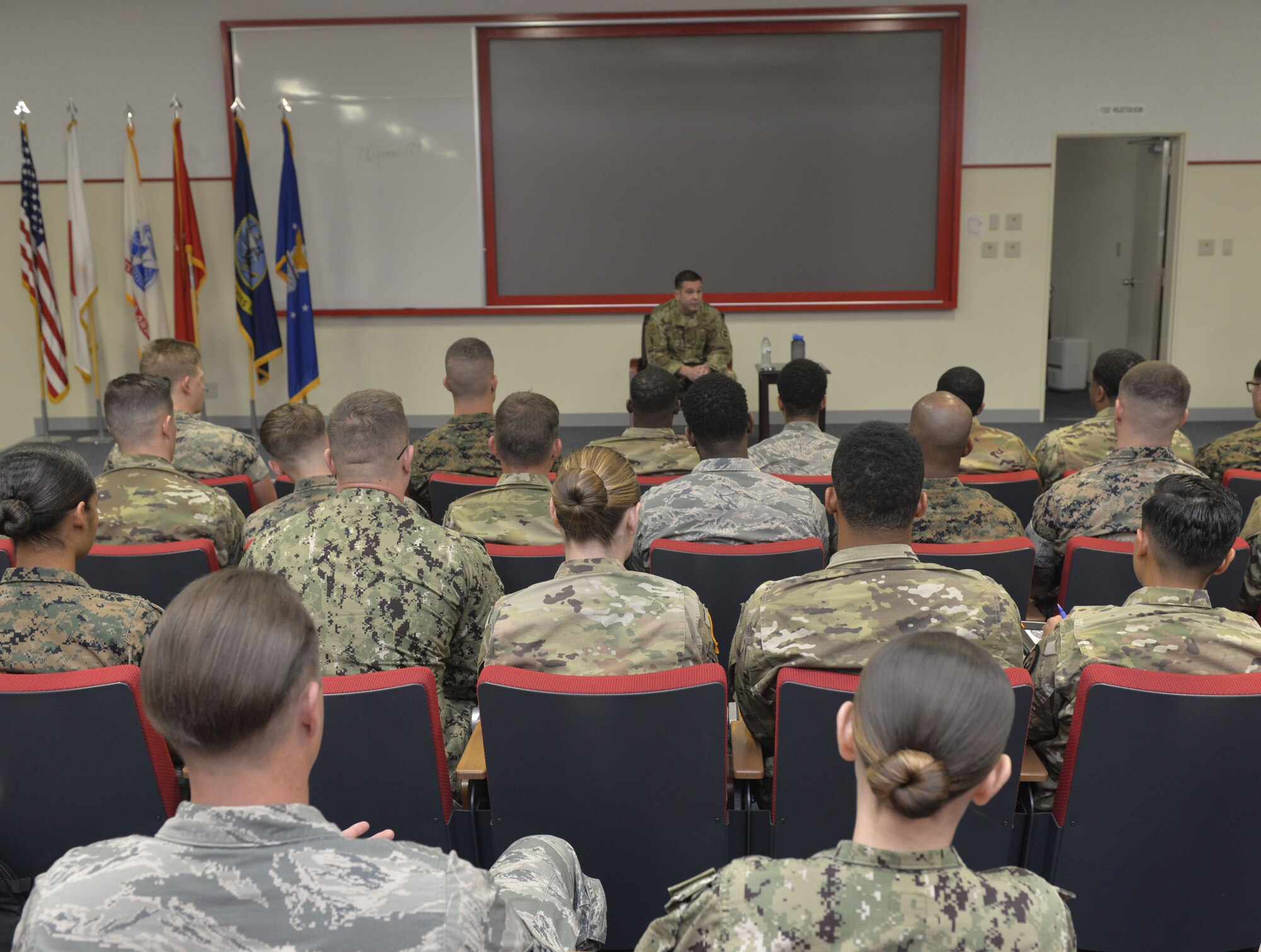 U.S. Air Force Command Chief Master Sgt. Rick Winegardner, U.S. Forces Japan Command Senior Enlisted Leader, discusses the future of warfighting across the Pacific theater of operations and how it will include U.S. servicemembers from all branches with members of the Okinawa Joint Experience April 1, 2019, at Kadena Air Base, Japan. With the military becoming more and more integrated in order to ensure mission success, leaders at every level must know and be comfortable operating in a joint environment. (U.S. Air Force photo by Staff Sgt. Benjamin Sutton)