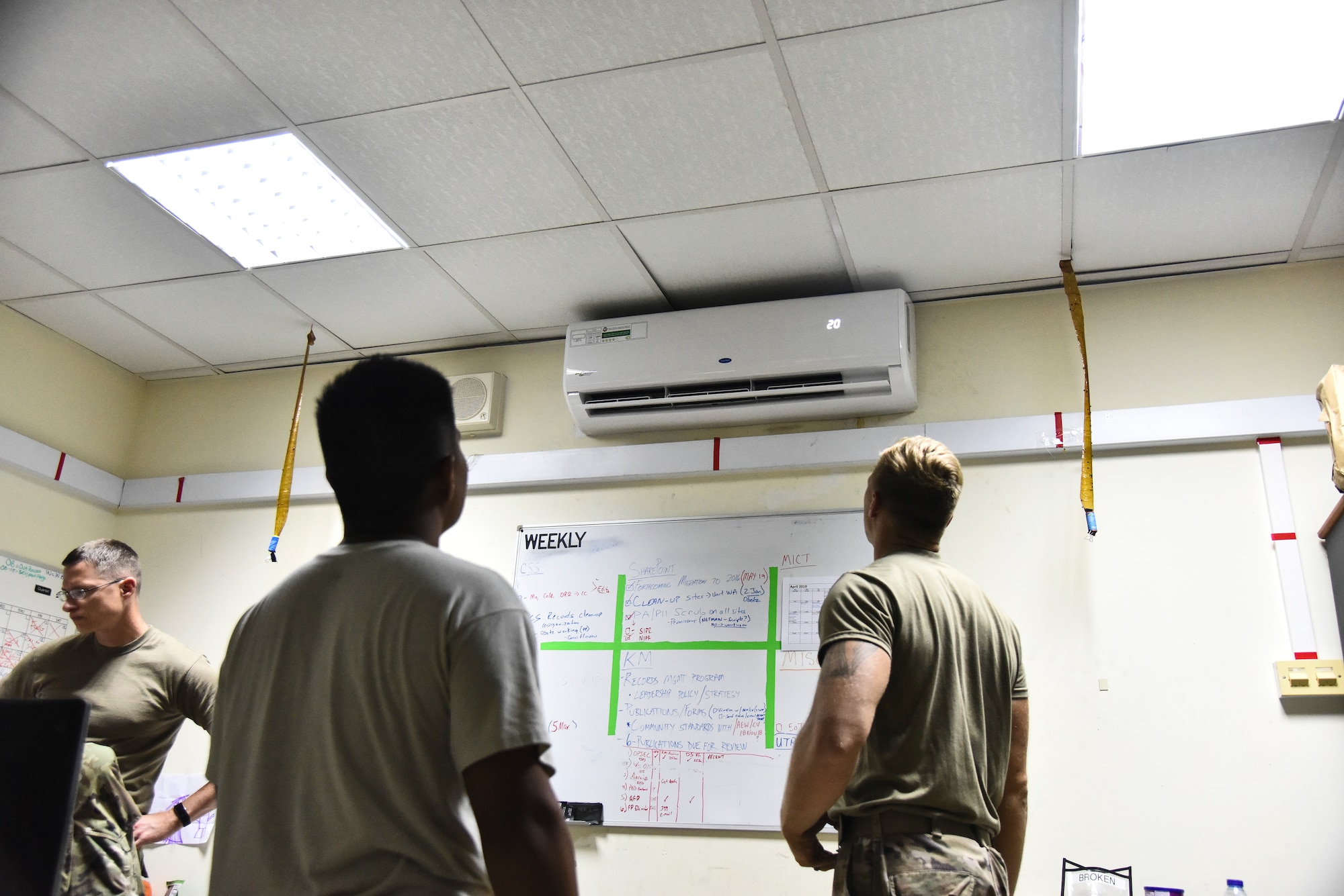 380th Expeditionary Civil Engineer Squadron Heating, Ventilation, Air Conditioning and Refrigeration journeymen, test out a new A/C unit at Al Dhafra Air Base, United Arab Emirates, April 8, 2019. HVAC Airmen monitor systems operation to ensure efficiency and compliance technical orders, manufacturer handbooks, local procedures, codes, and directives. (U.S. Air Force photo by Senior Airman Mya M. Crosby)