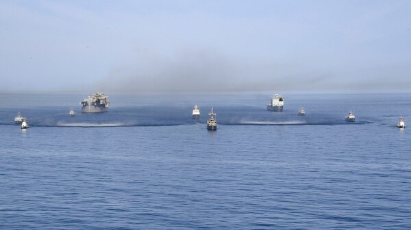 ARABIAN GULF (April 10, 2019) U.S. Navy expeditionary sea base USS Lewis B. Puller (ESB 3), fleet ocean tug USNS Catawba (T-ATF 168), Avenger-class mine countermeasures ship USS Sentry (MCM 3), Island-class coastal patrol boats USCGC Maui (WPB 1304) and USCGC Wrangell (WPB 1332); the United Kingdom Royal Navy’s RFA Cardigan Bay (L3009); the French Marine Nationale’s minehunters FS L’Aigle (M647) and FS Sagittaire (M650); the United Kingdom Royal Navy’s minehunters HMS Shoreham (M112) and HMS Ledbury (M30); and Mine Countermeasures Squadron (HM-15) MH-53E Sea Dragon helicopters navigate the Arabian Gulf in formation during Artemis Trident 19. Artemis Trident is a mine countermeasures exercise conducted by France’s Marine Nationale, the United Kingdom’s Royal Navy and the U.S. Navy in the Arabian Gulf focused on increasing interoperability and demonstrating the nations’ shared commitment to ensuring unfettered maritime operations. (U.S. Navy photo by Mass Communication Specialist 2nd Class Samantha P. Montenegro/Released)