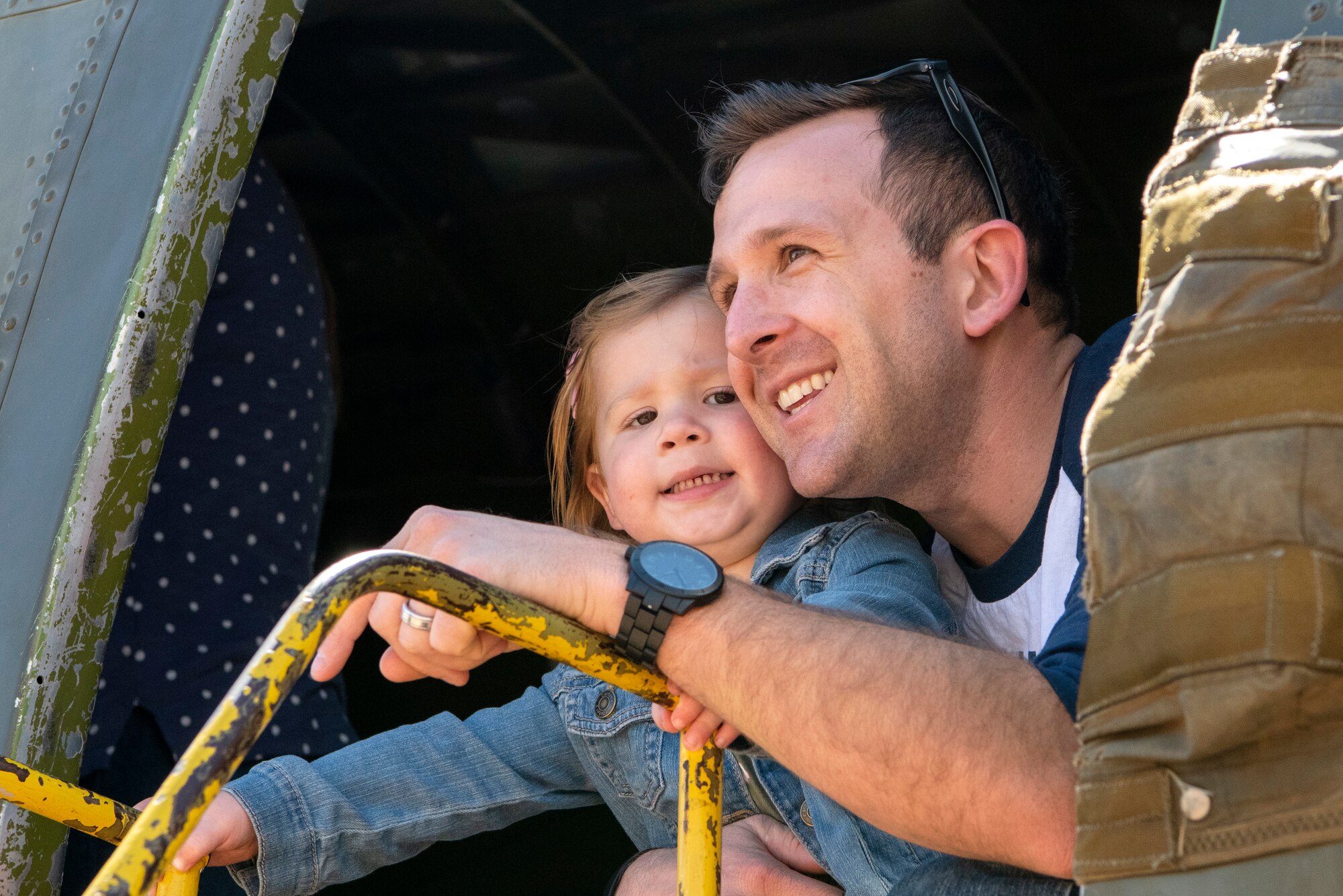Family looks out C-47 door