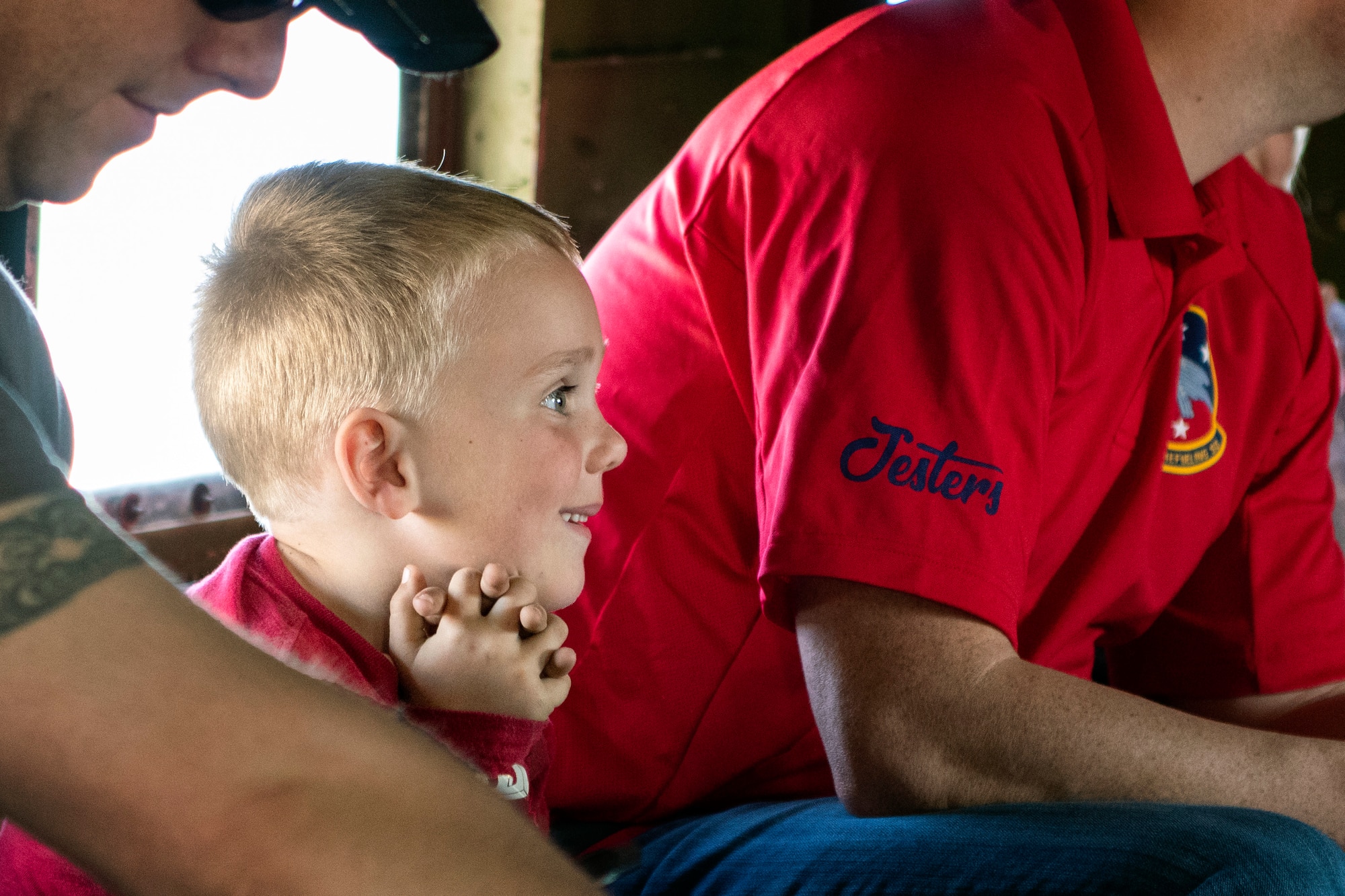Child looks out C-47 window