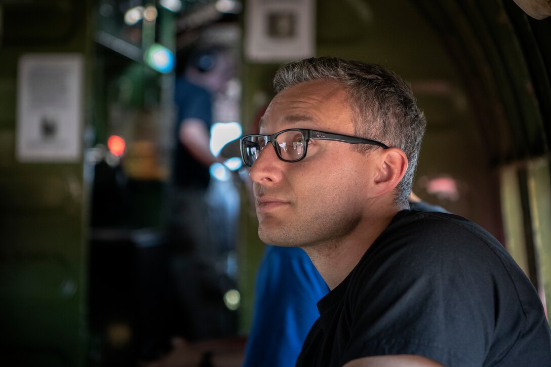 Man looks out C-47 window