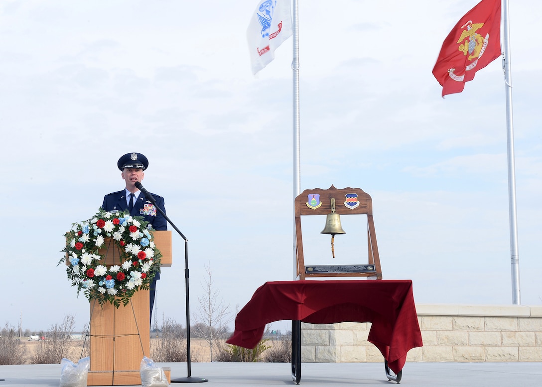 U.S. Air Force Col. Michael Manion, 55th Wing commander, speaks at the Omaha National Cemetery as the 55th Wing Association dedicated a monument to all of the past, present and future members of the 55th Wing on April 6, 2019. The ceremony was attended by scores of wing veterans as well as a large contingent of those currently serving in the unit. (U.S. Air Force photo by Charles Haymond)