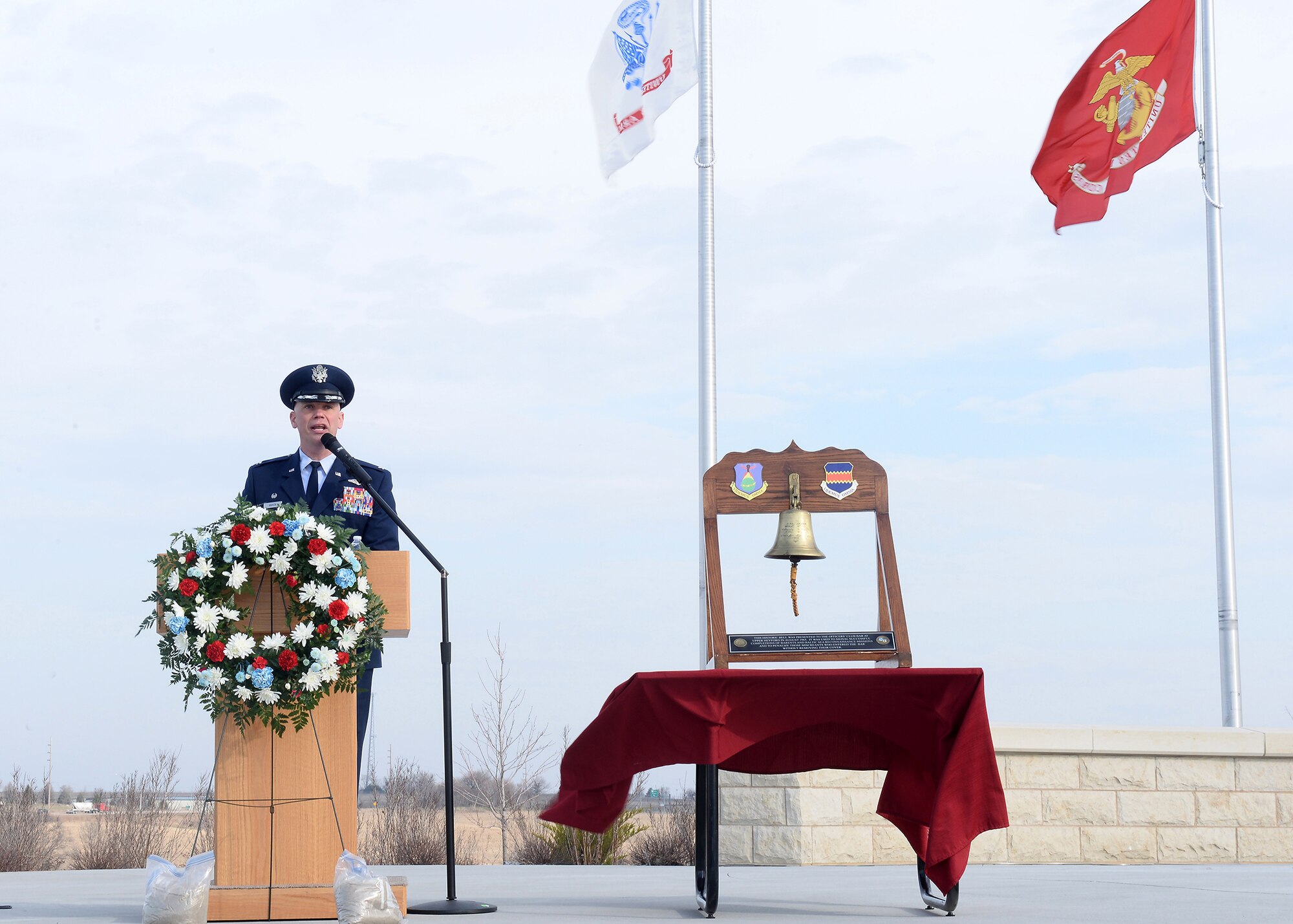 U.S. Air Force Col. Michael Manion, 55th Wing commander, speaks at the Omaha National Cemetery as the 55th Wing Association dedicated a monument to all of the past, present and future members of the 55th Wing on April 6, 2019. The ceremony was attended by scores of wing veterans as well as a large contingent of those currently serving in the unit. (U.S. Air Force photo by Charles Haymond)