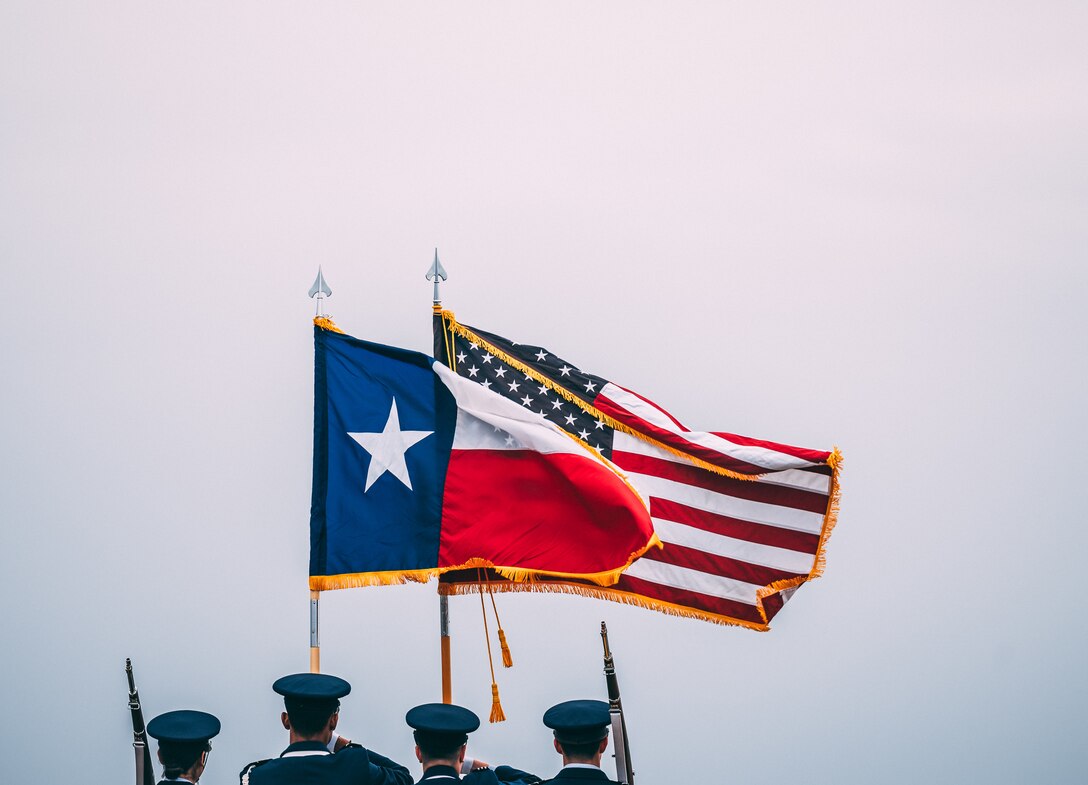 Baylor University Air Force ROTC cadets present the American and Texas state flag during the National Anthem at the Heart of Texas airshow April 7, 2019, in Waco, Texas. The airshow featured the U.S. Air Force Thunderbirds along with the F-35A Lightning II Demonstration Team. (U.S. Air Force photo by Senior Airman Alexander Cook)