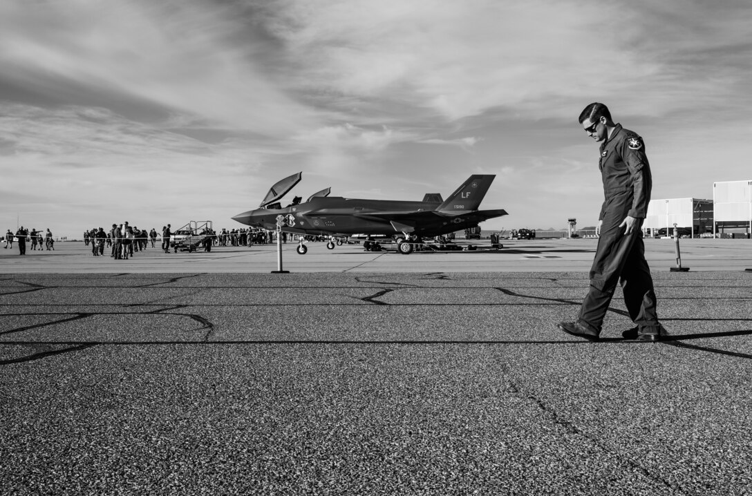 Capt. Andrew “Dojo” Olson, F-35 Demonstration Team pilot and commander outlines the aerial demonstration by stepping through each maneuver before his final certification flight March 2, 2019, at Davis-Monthan Air Force Base, Ariz. Accustomed to pilot training, Olson both mentally and physically prepares himself before each flight. (U.S. Air Force photo by Senior Airman Alexander Cook)