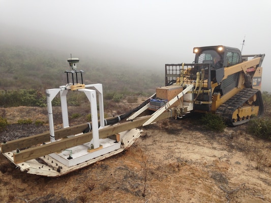 Advanced electromagnetic induction sensors are used to distinguish unexploded ordnance (UXO) from scrap metal at a munitions response site at Fort Ord, California.