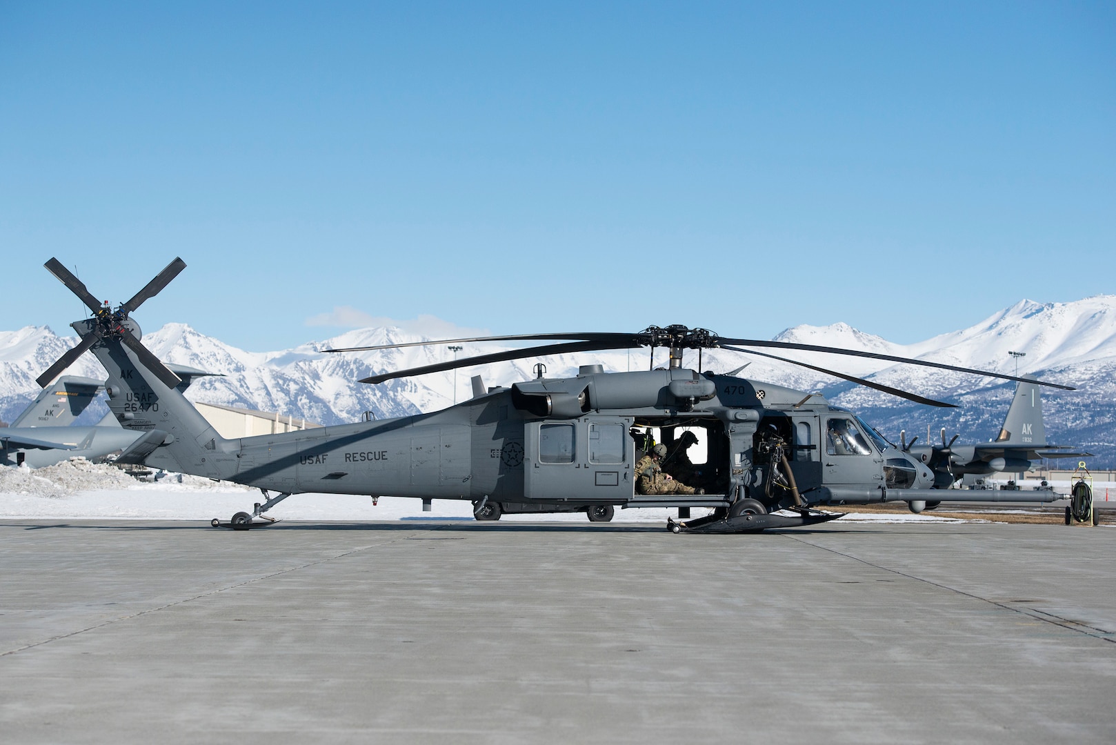 Alaska Air National Guardsmen with the 210th Rescue Squadron prepare to conduct aerial gunnery training at Joint Base Elmendorf-Richardson, Alaska, March 19, 2019. A helicopter from the same unit was involved in rescuing an injured skier April 10, 2019.