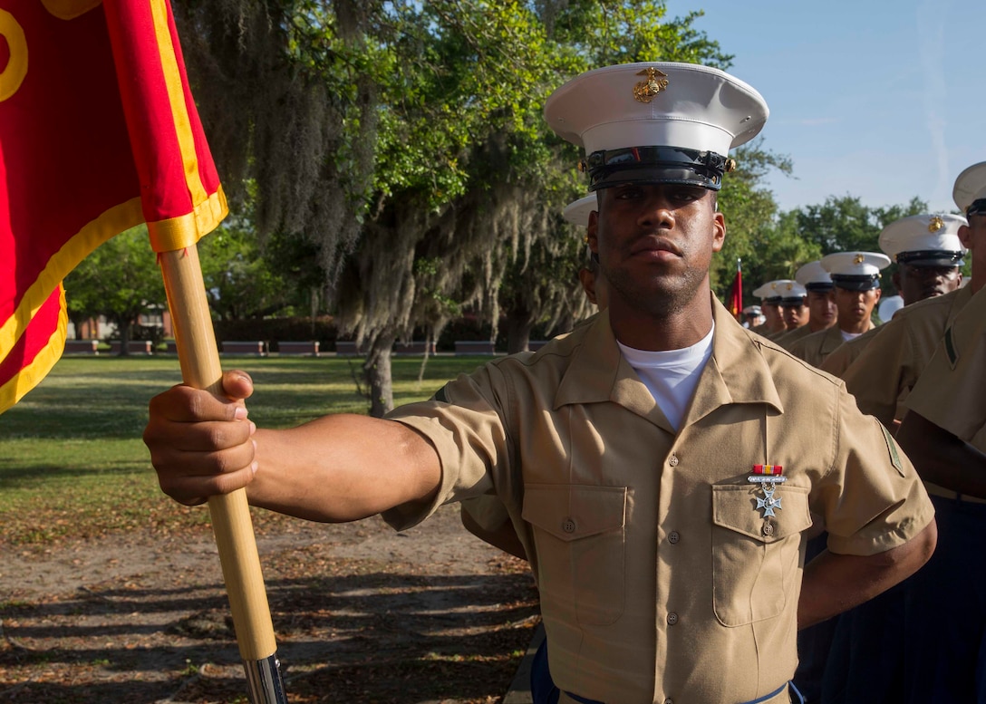 Pfc. Brian K. Dixon graduated from Marine recruit training today as the platoon honor graduate of Platoon 2030, Company F, 2nd Battalion, Recruit Training Regiment.
The honor graduate award recognizes the Marine who best exemplifies the total Marine concept, which encompasses physical fitness, marksmanship and leadership traits, during recruit training. 
Dixon, a native of Saraland, Alabama, acted as platoon guide for Platoon 2030.
Dixon, was recruited at Recruiting Substation Mobile, by Staff Sgt. Adam E. Gillette. 

Please send all queries to the Assistant Marketing and Communications Officer, 2nd Lt. Mackenzie Margroum, Mackenzie.margroum@marines.usmc.mil