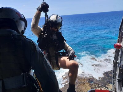 HSC-25 Rescues Two Fishermen From Sunken Watercraft