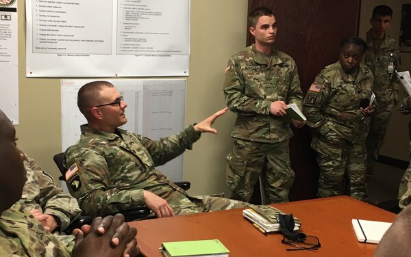 Members of Task Force Logistics collaborate during a break-out session at a mission planning conference hosted at Joint Task Force Civil Support (JTF-CS) headquarters at Fort Eustis, Va. April 9-11. The main focus of the conference was to prepare for an upcoming major disaster-response training exercise and the Defense Chemical, Biological, Radiological and Nuclear Response Force (DCRF) mission. The attendees represented JTF-CS and units comprising four task forces including operations, medical, logistics and aviation, and other organizations preparing for Exercise Vibrant Response-Guardian Response 2019 which will be held in locations in Michigan, Indiana and some support in Texas, April 29-May 6. (Official DoD photo by Army 1LT Lindsey Riordan/released)