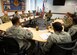 Chief Master Sgt. of the Air Force Kaleth O. Wright briefs instructors at the Vosler Noncommissioned Officer Academy on Peterson Air Force Base, Colo., April 11, 2019. During his visit, Wright told stories of his time as an NCOA instructor and stressed the importance of professional military education in developing Airmen. (U.S. Air Force photo by Staff Sgt. Emily Kenney)