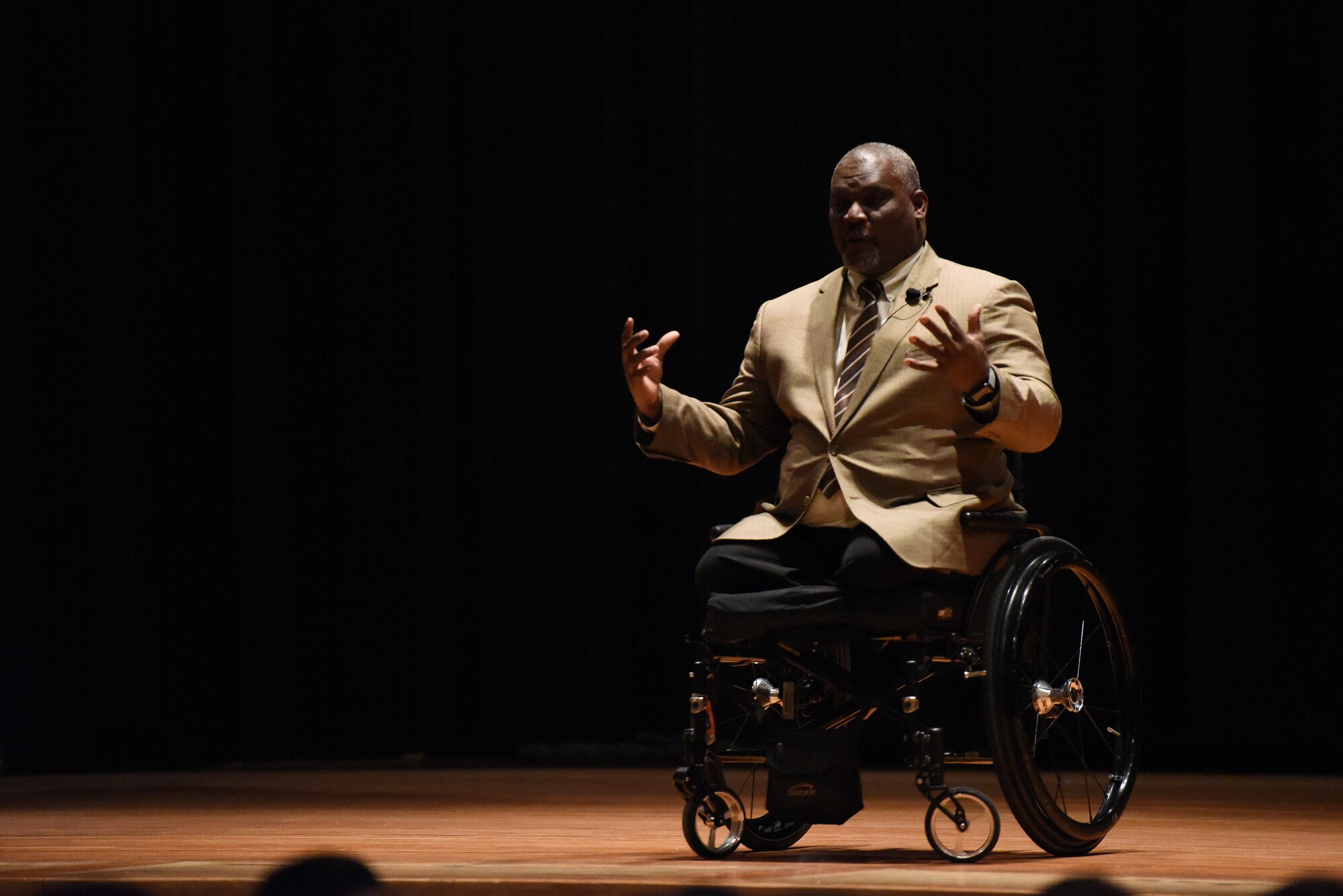 Retired Army Col. Gregory Gadson speaks to Airmen during a special presentation April 11, 2019, at the theater on Malmstrom Air Force Base, Mont.