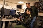 A student at the Defense Language Institute at Joint Base San Antonio-Lackland, Texas uses a Simulated Environment Realistic Air Traffic Control, or SERA. SERA is a voice-prompted aviation simulation software students use to practice a variety of maneuvers like takeoffs and maintaining air speeds while communicating to the tower in English. (U.S. Air Force photo by Airman 1st Class Dillon Parker)