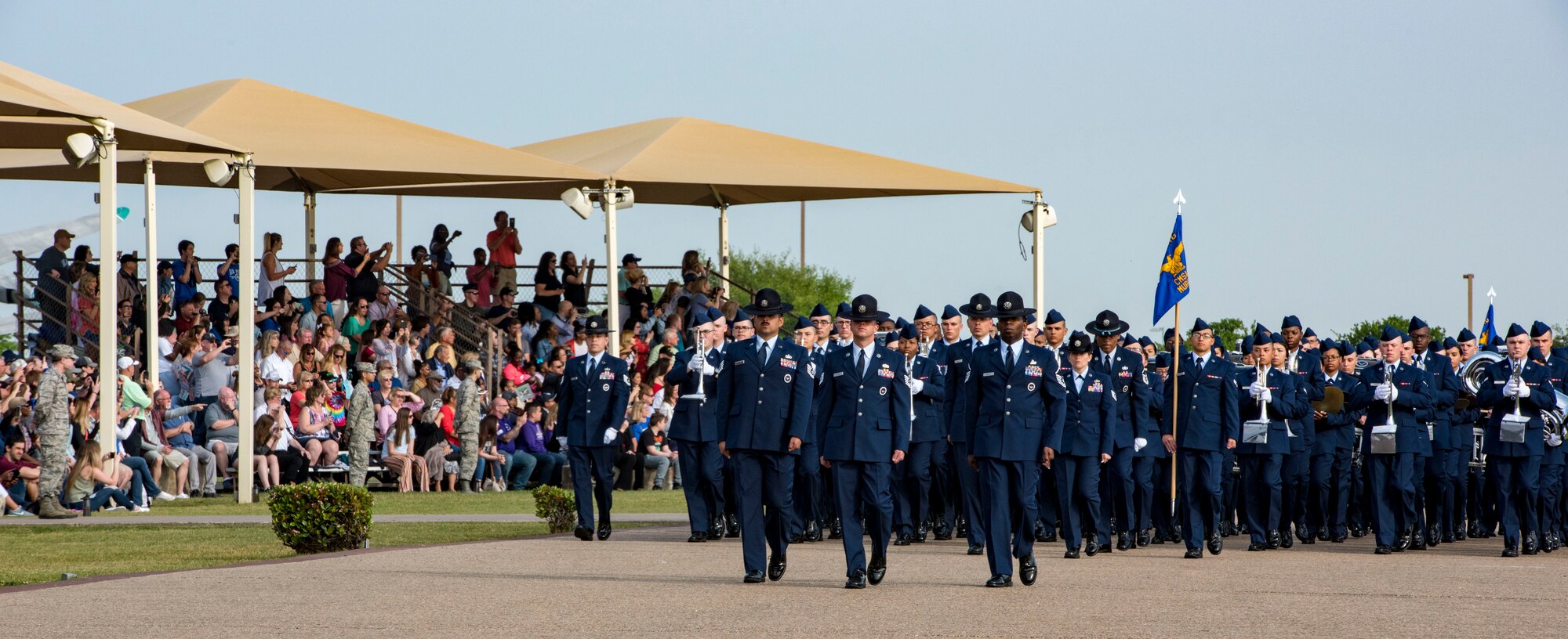 Airmen and military training instructors march in a basic military training graduation parade April 5, 2019, at Joint Base San Antonio-Lackland, Texas. The 37th Training Wing at JBSA-Lackland is the largest training wing in the United States Air Force. The wing encompasses six major training missions within its six groups.