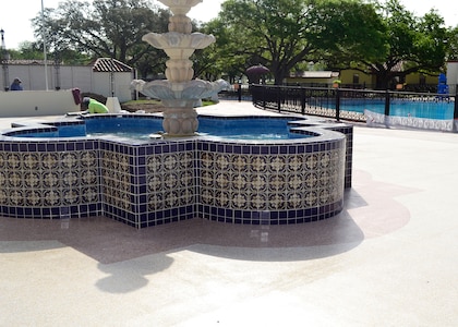 Workers carry out restoration work on the Parr Club fountain in the center of Joint Base San Antonio-Randolph, Texas on April 19, 2019. A ribbon-cutting ceremony to celebrate the completion of the project and opening of the patio is planned in the near future.