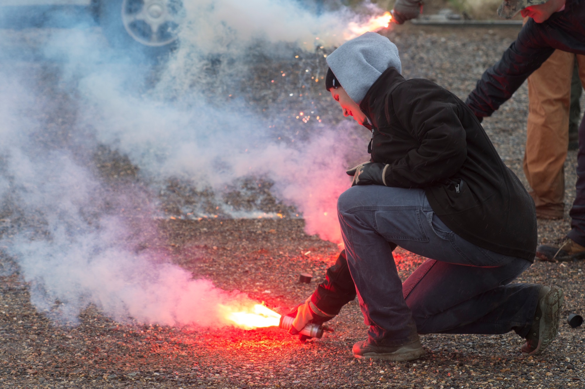Staff Sgt. Anna Ferrari, 366th Operations Support Squadron unit training manager, sets off a flare during Survival, Evasion, Resistance and Escape exercise within Gunfighter Flag, April 2, 2019 at Saylor Creek Range Complex, Idaho. The exercise Gunfighter Flag is held once a quarter to hone skills of 366th Fighter Wing Airmen. (U.S. Air Force photo by Airman 1st Class JaNae Capuno)
