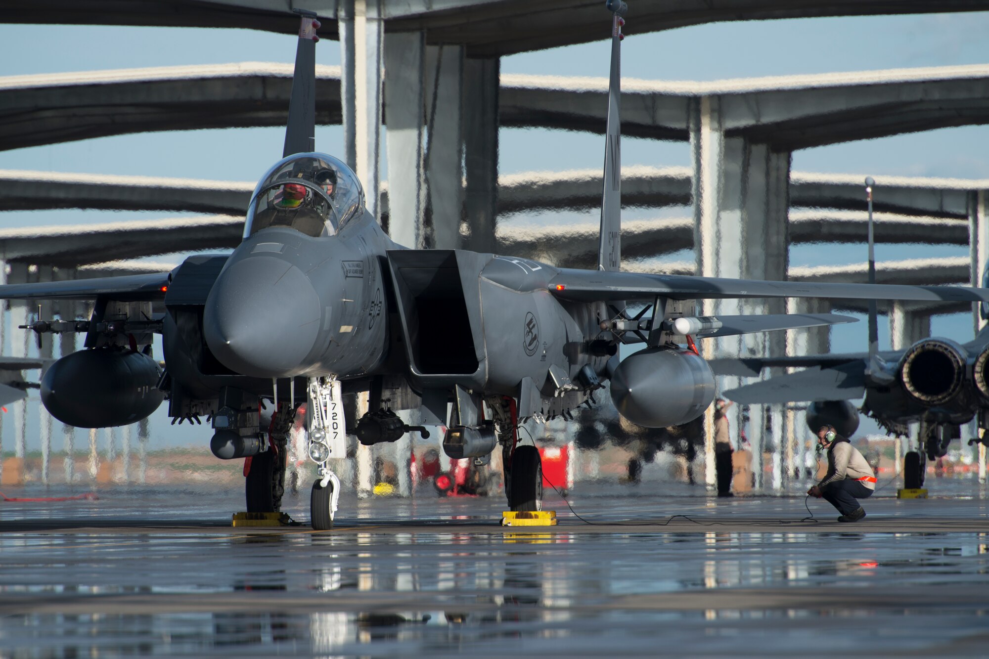 An F-15E Strike Eagle undergoes a pre-flight inspection during Gunfighter Flag, April 5, 2019 at Mountain Home Air Force Base, Idaho. The exercise Gunfighter Flag is held once a quarter to hone skills of 366th Fighter Wing Airmen. (U.S. Air Force photo by Airman 1st Class JaNae Capuno)