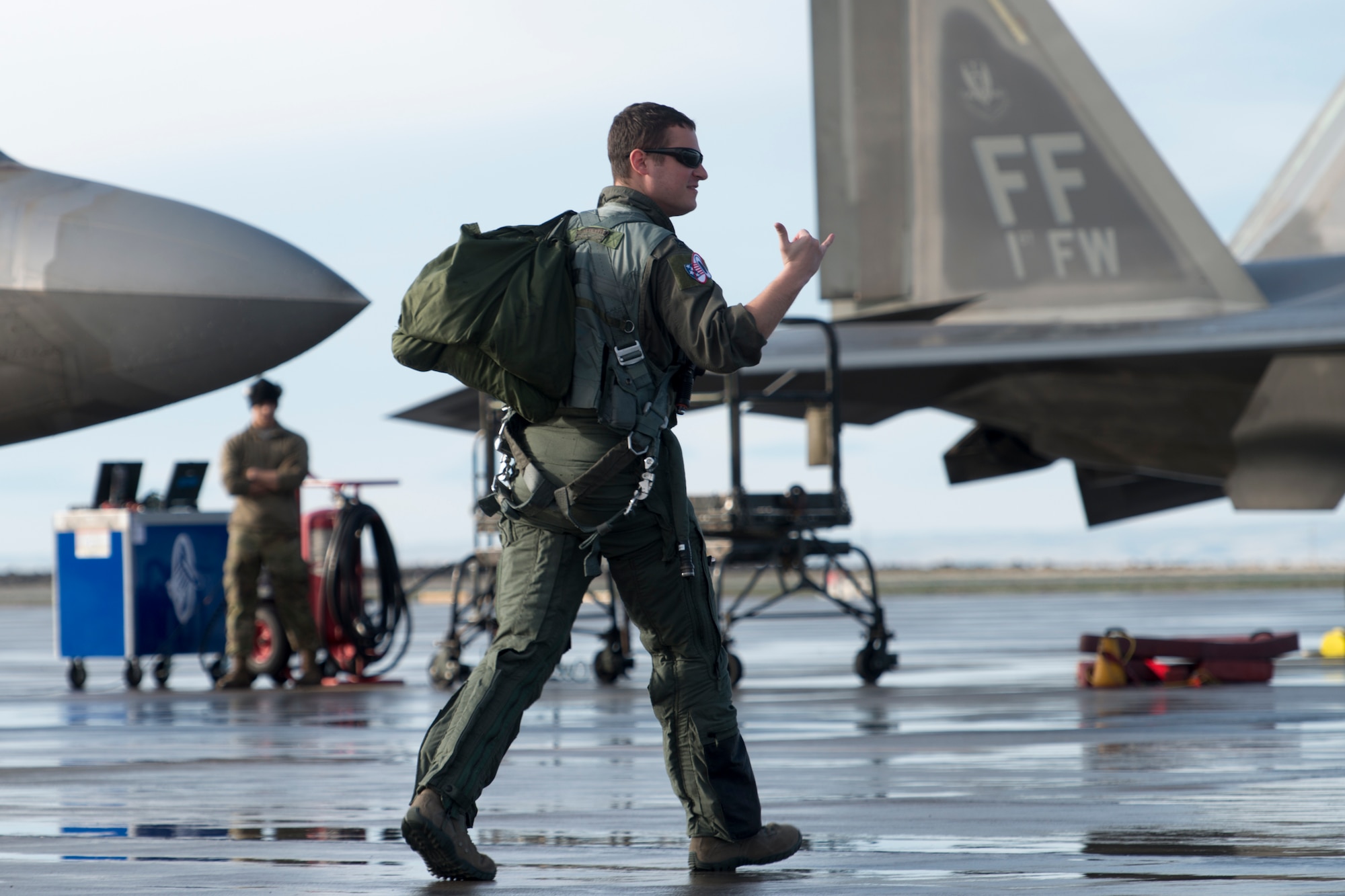 An F-22 Raptor pilot, from the 1st Fighter Wing stationed out of Joint Base Langley Eustis, Virginia, walks to his jet during Gunfighter Flag, April 5, 2019 at Mountain Home Air Force Base, Idaho. The exercise Gunfighter Flag is held once a quarter to hone skills of 366th Fighter Wing Airmen. (U.S. Air Force photo by Airman 1st Class JaNae Capuno)